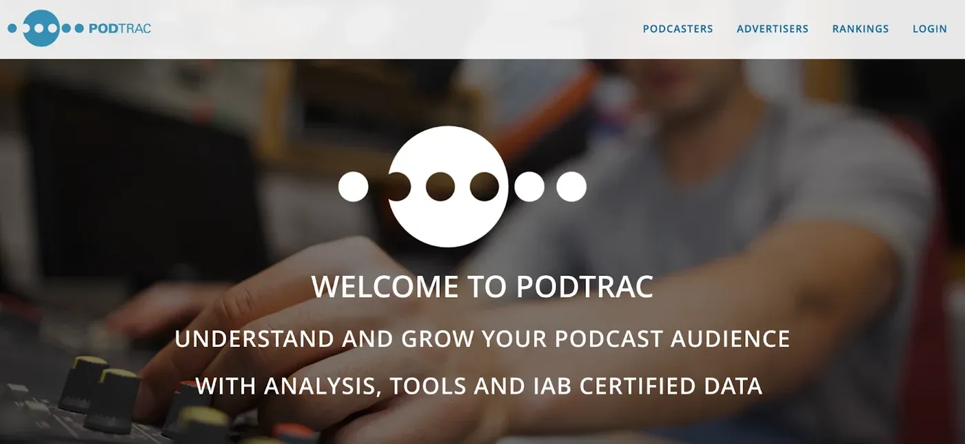 Podtrac homepage hero reading "Welcome to Podtrac" over a person adjusting an audio mixing board