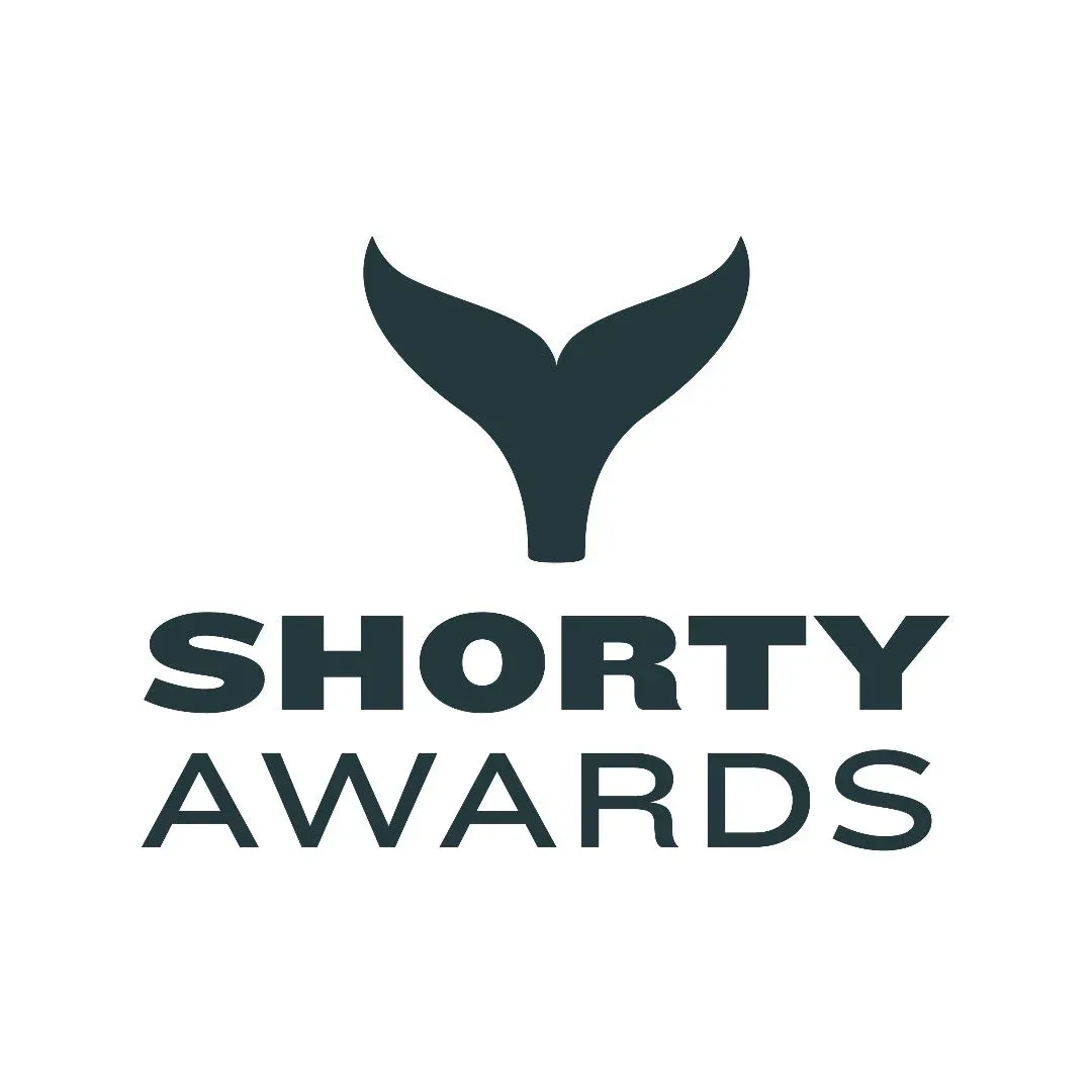 Shorty Awards logo with a dark whale tail above the stacked words "SHORTY AWARDS" on white