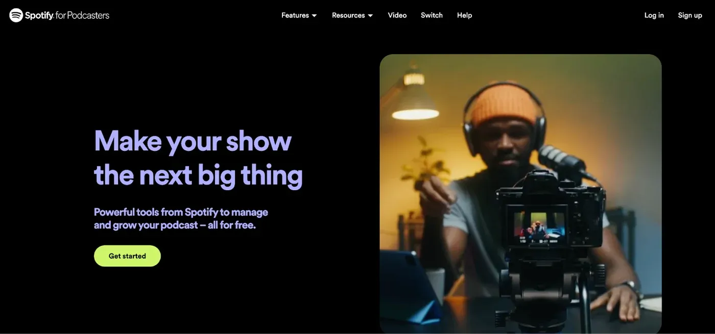 Spotify for Podcasters homepage headlined "Make your show the next big thing" beside a person recording on camera.