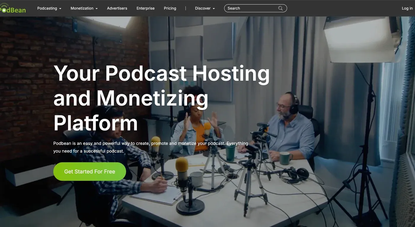 Podbean homepage headline "Your Podcast Hosting and Monetizing Platform" over people recording at a mic-covered table